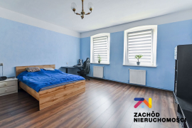 Bezczynszowe mieszkanie w centrum z działką